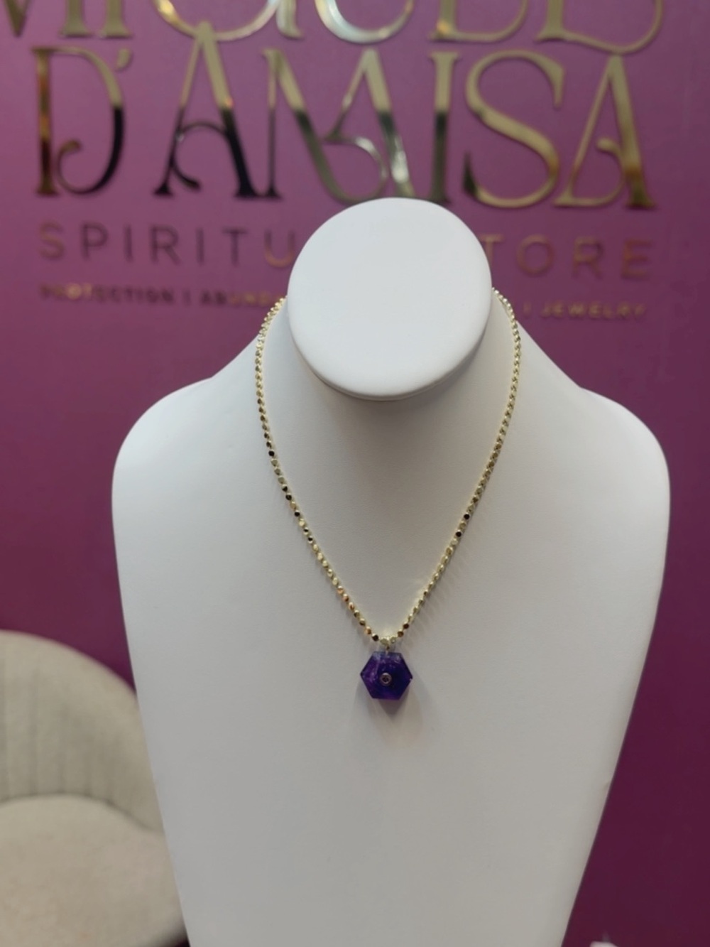 Gold Beaded Necklace with Purple Gem Pendant -